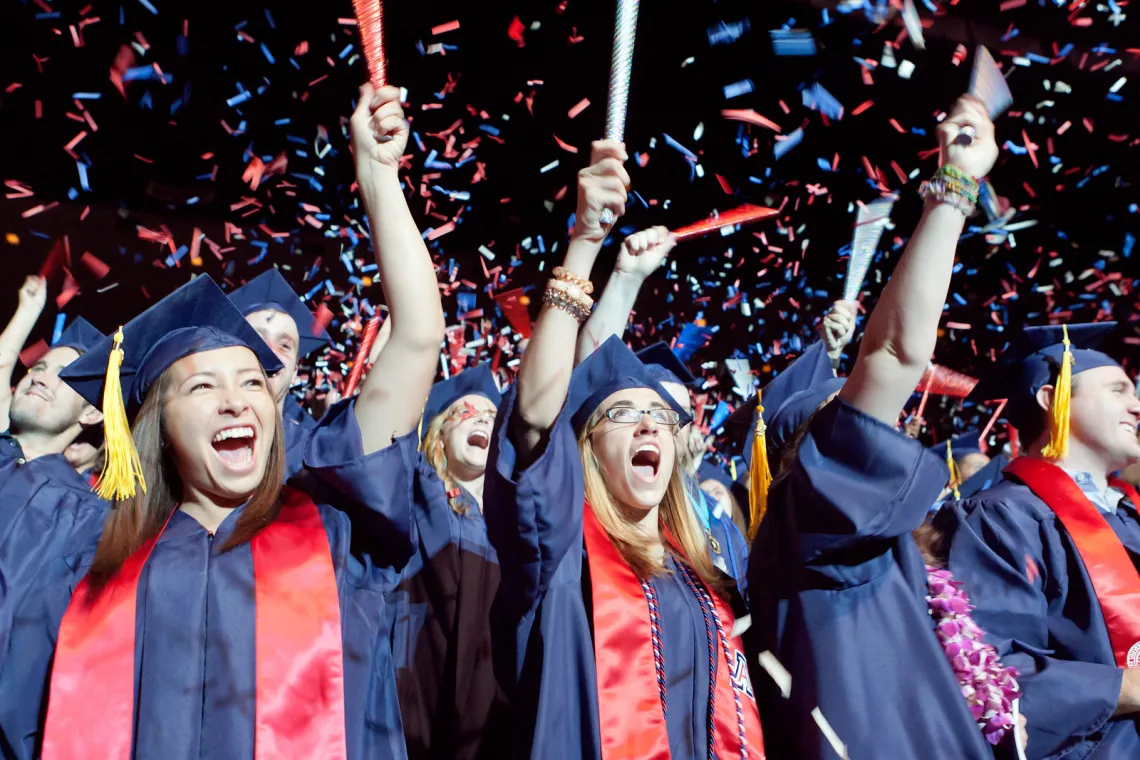 Students celebrating graduation